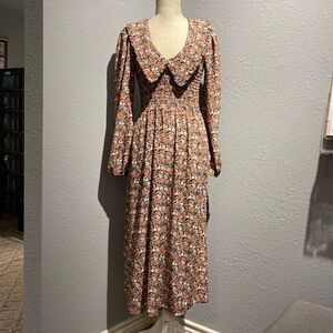 Chanler Henry long v neck dress with puffy sleeves